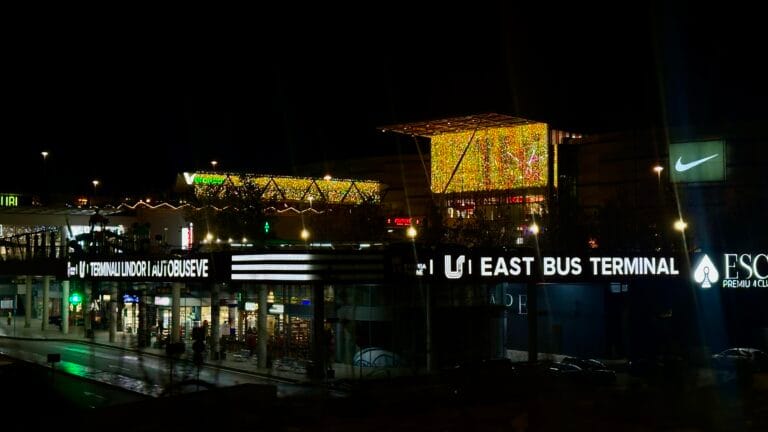 TEG At Night, showing the sign for the bus terminal as well as the main mall.