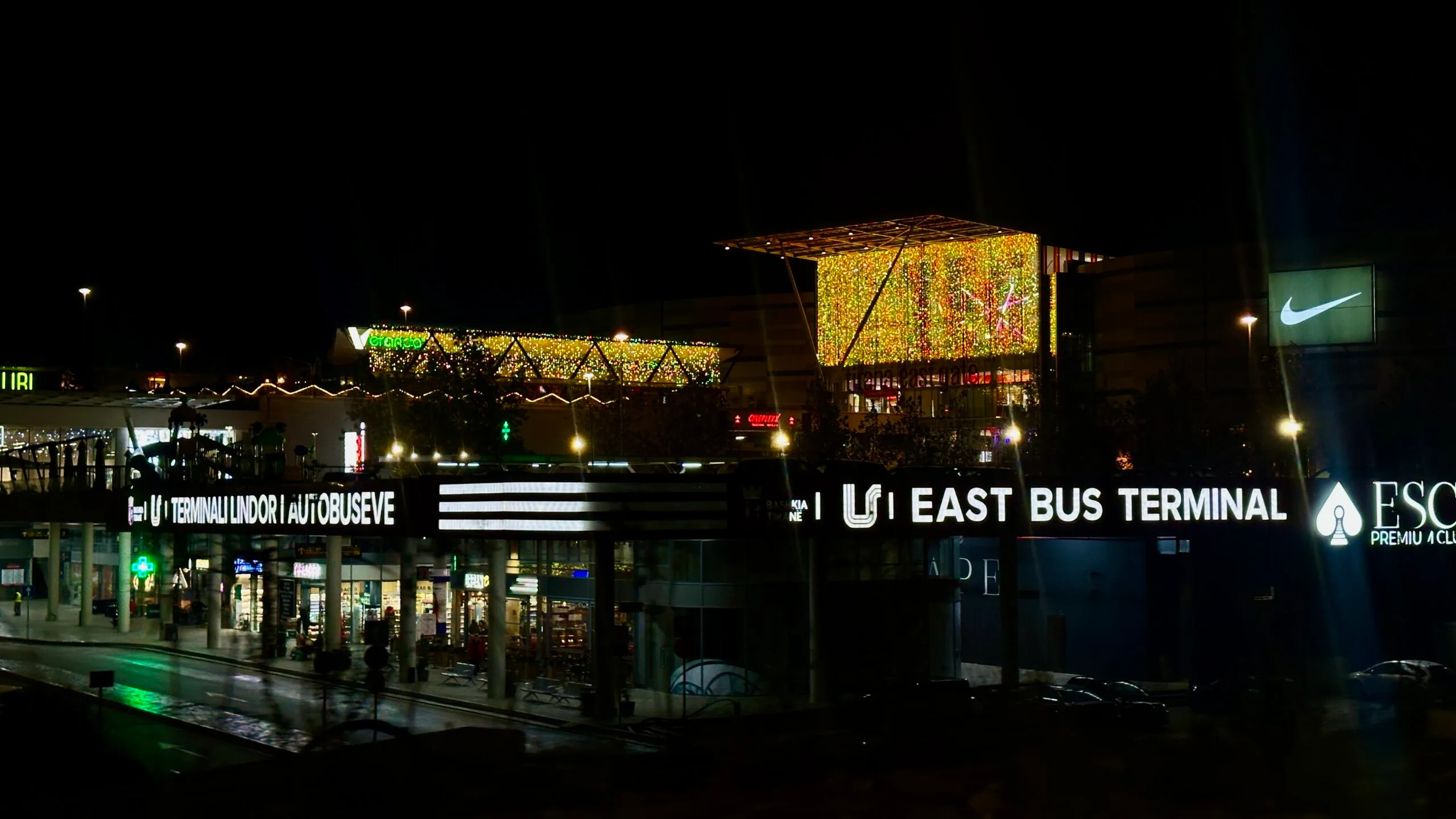 TEG At Night, showing the sign for the bus terminal as well as the main mall.