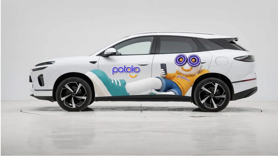 Patoko taxi with the Toko mascot artwork on the side