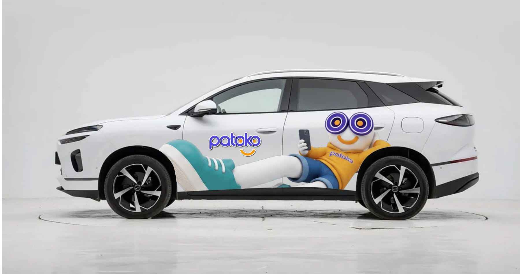 Patoko taxi in the new livery with the Toko mascot artwork
